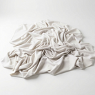 Interlock (Stretch) Wholesale Fabric in Off/White 7105 - piled fabric view