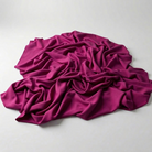 Interlock (Stretch) Drapery Panel in Magenta 1825 - fabric detail 2