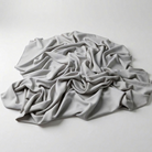 Interlock (Stretch) Wholesale Fabric in Silver 1302 - piled fabric view