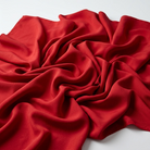 Interlock (Stretch) Wholesale Fabric in Red 1190 - loose-fold fabric view