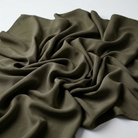 Interlock (Stretch) Wholesale Fabric in Olive/D 8335 - loose-fold fabric view