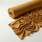 Interlock (Stretch) Drapery Panel in Gold 2009 - fabric roll