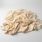Interlock (Stretch) Wholesale Fabric in Vanilla 1111 - piled fabric view