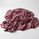 Interlock (Stretch) Wholesale Fabric in Mauve/D 1801 - piled fabric view