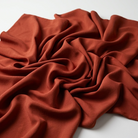 Interlock (Stretch) Wholesale Fabric in Cinnamon 8599 - loose-fold fabric view