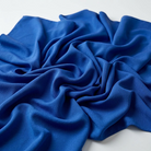 Interlock (Stretch) Wholesale Fabric in Royal 1144 - loose-fold fabric view