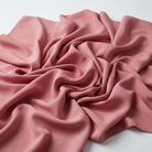 Interlock (Stretch) Wholesale Fabric in Rose/Dust 7662 - loose-fold fabric view