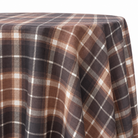Plaid (Poly Print) in Cinnamon — table linen draped over a round table