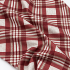 Plaid (Poly Print) in Ruby — loose fabric in a broad flowing drape; fabric-only view, not a finished napkin