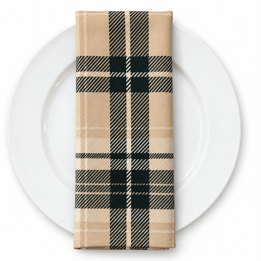 Plaid (Poly Print) in Ivory Noir — folded napkin on a white plate