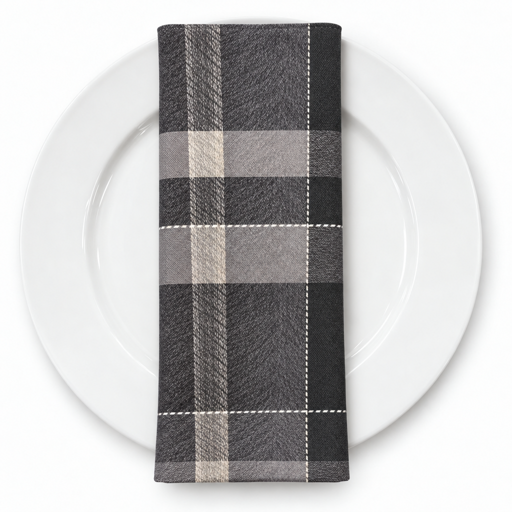 Plaid (Poly Print) in Slate Grey — folded napkin on a white plate