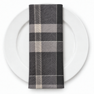 Plaid (Poly Print) in Slate Grey — folded napkin on a white plate