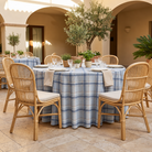 Plaid (Poly Print) in Denim Blue — table linen in a courtyard table setting